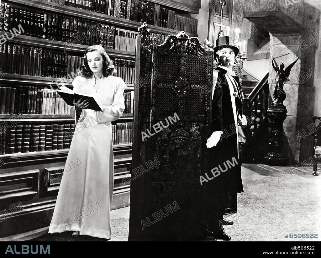 CHARLES KORVIN and ELLA RAINES in ARSENE LUPIN RETURNS, 1938, directed by GEORGE FITZMAURICE.