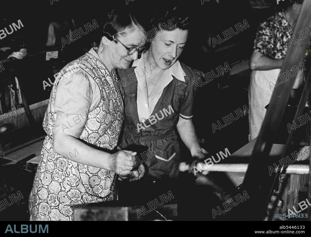 M.P's First Day as "Mill Girl" Mrs. Barbara Castle, 35-year-old M.P., and Parliamentary Secretary to the Board of trade, is working in a Preston, Lancashire mill for a week in order to get to know the women he Cotton industry, their working; conditions and their domestic and welfare needs. She is living in a Cottage wit a Weaver's family. she began her week's work by being; late on the first day but promised to report promptly at 7.30 a.m. for rest of the, week. September 25, 1947. (Photo by Mirror Feature).