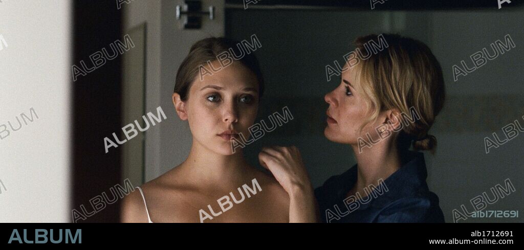 ELIZABETH OLSEN and SARAH PAULSON in MARTHA MARCY MAY MARLENE, 2011, directed by SEAN DURKIN. Copyright ACT ZERO FILMS.