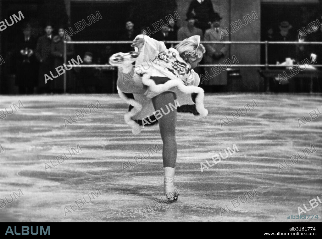 New York, New York:  February 8, 1937. Viennese figure skater, Melitta Brunner, performs a solo dance at the Rockefeller Center skating pond as a benefit for the Red Cross fund for flood sufferers. It is her first trip to the United States.