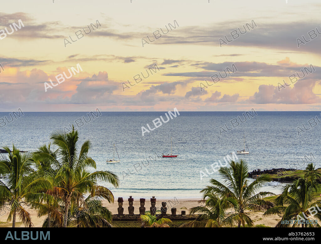 Moais in Ahu Nau Nau by the Anakena Beach at sunrise, elevated view, Rapa Nui National Park, UNESCO World Heritage Site, Easter Island, Chile, South America.