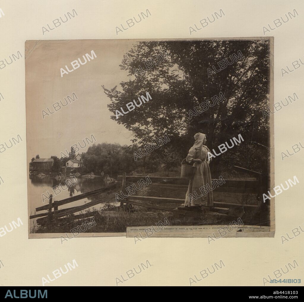 Waiting. Woman in pioneer costume posed in tranquil country scene, 1900.