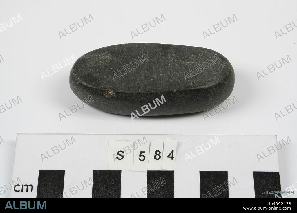 An elongated, round stone with two flat sides, probably used as grinding or rubble stone, tools, stone, L 6.5 cm, W 2.7 cm, H 1.8 cm, Turkey.