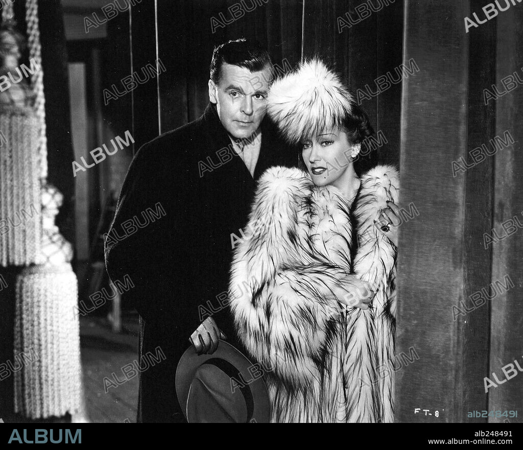 GLORIA SWANSON and NEIL HAMILTON in FATHER TAKES A WIFE, 1941, directed by JACK HIVELY. Copyright RKO.