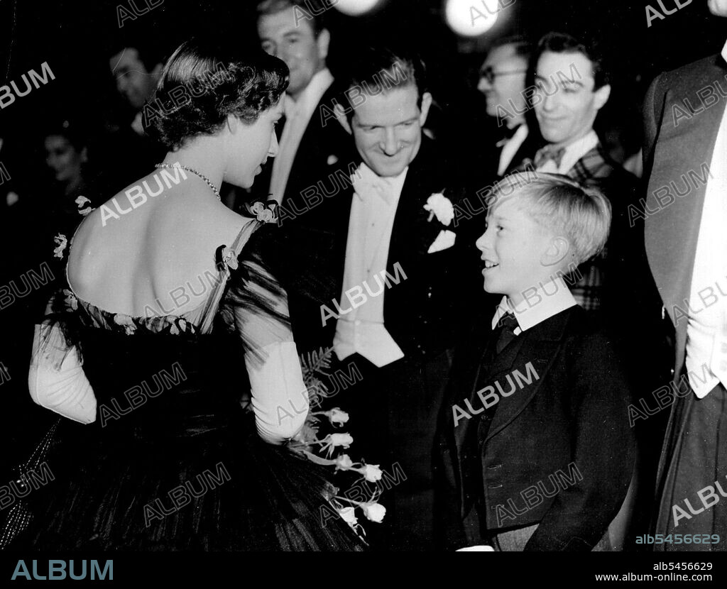 Royal film show "The Mudlark" at the Empire Theatre Leicester Square.Princess Margaret talks to Ted Ray and his son Andrew, who is child star of the show. November 30, 1950. (Photo by Daily Mail Contract Picture).