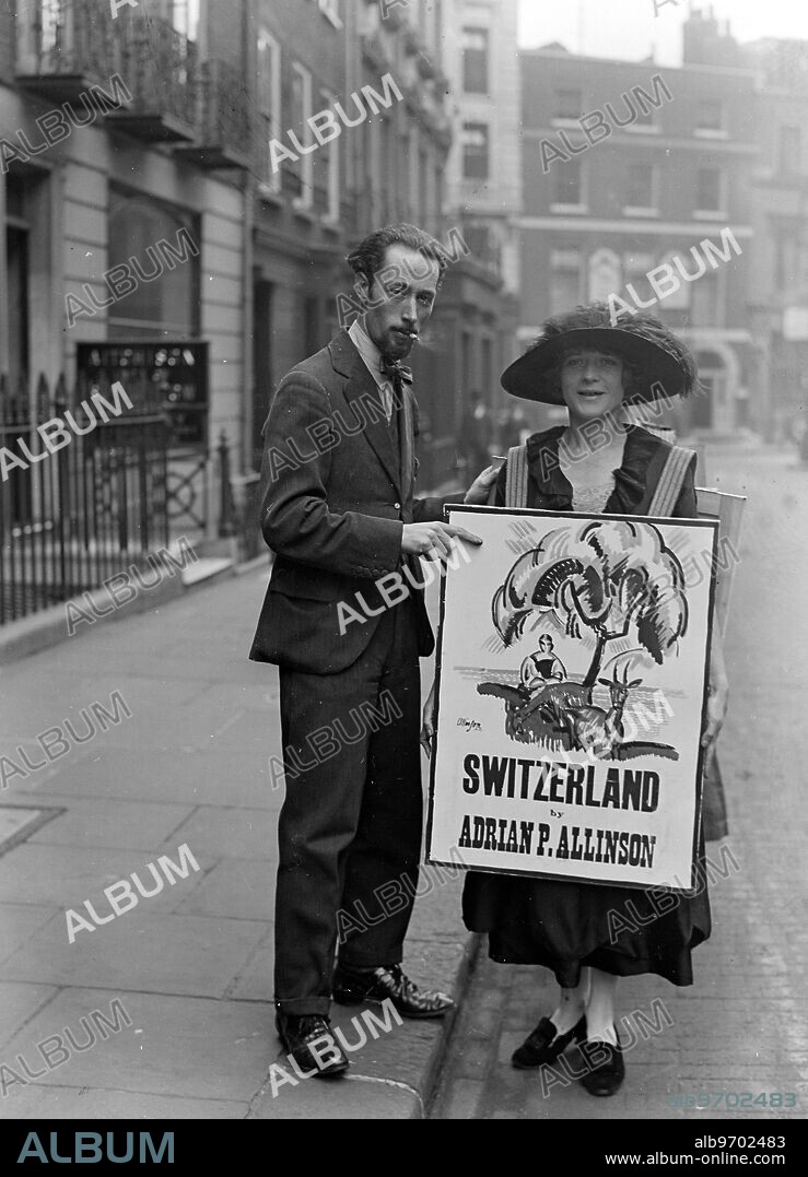 Artist ' s wife as sandwich man . Mrs Allinson , wife of the well known artist , Mr Adrian Allinson , has undertaken to advertise her husband ' s exhibition of pictures by parading the West End with sandwich boards designed by her husband . Mr Allison adjusting the boards for his wife . 1 June 1922.