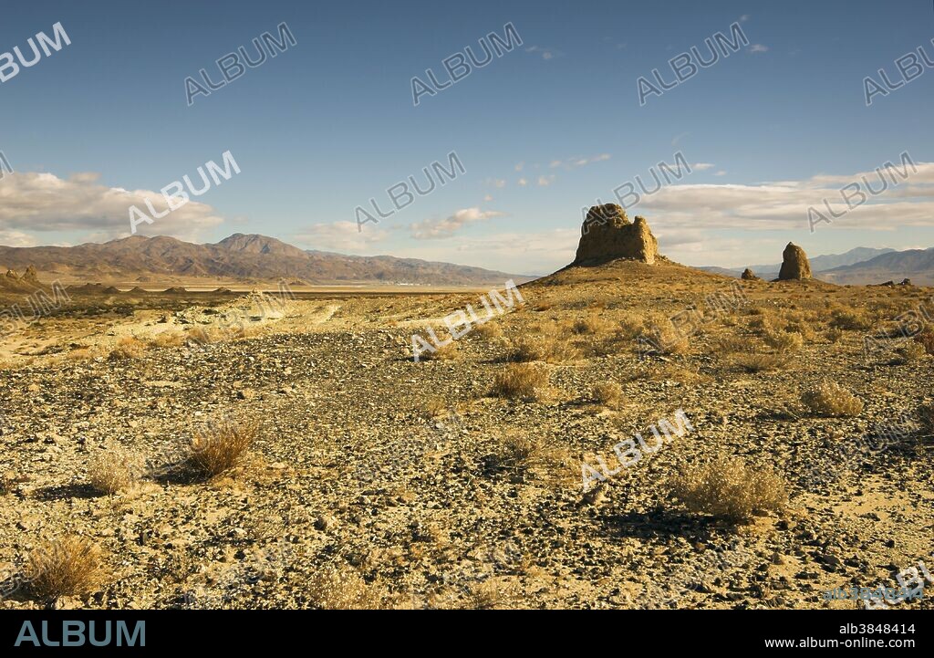 Trona Pinnacles National Natural Landmark, located in the Mojave Desert near the mining town of Trona, California, is a vestige of a former inland sea. The spires were formed underwater in the same manner as the tufa formations at Mono Lake, California.