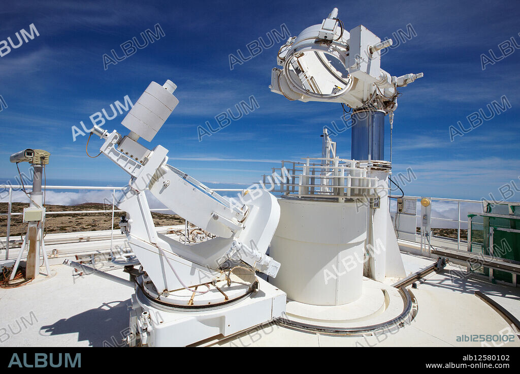 The Vacuum Tower Telescope VTT, Solar Telescope, Observatorio del Teide, Tenerife, Canary Islands, Spain The VTT and the GREGOR are operated by four German institutes: the Astrophysikalisches Institut Potsdam, the Kiepenheuer-Institut f¸r Sonnenphysik Freiburg, chair, the Max-Planck-Institut f¸r Sonnensystemforschung Lindau, and the Universitts-Sternwarte Gttingen The telescope is used for scientific observations from mid April through mid December Typically 30 to 40 observing campaigns are carried out every year The VTT is a classical solar telescope: two coelostat mirrors at the top feed the sunlight into the telescope which spans 10 floors The primary mirror has a diameter of 70 cm and a focal length of 46 m The main advantage of the coelostat system is the non-rotating solar image in the laboratory The VTT offers several spacious optical laboratories for all kinds of optical setups Some of the laboratories are used for permanent installations, but there is always room for specialized or dedicated instruments Since 1998 an adaptive-optics system has been developed at the KIS The main components of the system are a Shack-Hartmann wavefront sensor with 36 sub-apertures, a deformable mirror and a high-speed digital camera A closed-loop bandwidth of about 70 Hz is achieved Since 2003, the AO system is permantly installed and available to all focal plane instruments At present, a multi-conjugated adaptive optics system is being developed at the VTT The VTT is equipped with several focal plane instruments for the observation of objects and physical processes on the solar surface Some of these instruments have been developed at partner institutions: Echelle Spectrograph KIS, 1988, MSDP Obs Meudon, 1989, Fabry-PÈrot Interferometer USG, 1992, Triple Etalon Solar Spectrometer KIS, 1997, Tenerife Infrared Polarimeter IAC, 1998, Polarimetric Littrow Spectrograph KIS + HAO, 2001.