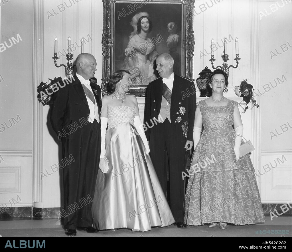 President Dwight D Eisenhower and his wife, Mamie Eisenhower, with their guests, President Charles de Gaulle of France and his wife, Yvonne de Gaulle (l-r), as they prepare to enter the White House dining room for a state dinner and musicale during de Gaulle's visit to the United States, Washington, DC, 4/22/60. (Photo by United States Information Agency/GG Vintage Images).