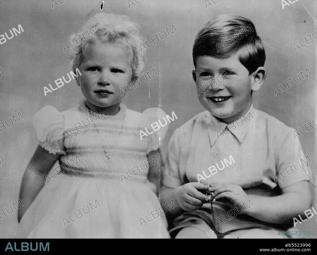 Princes Charles Birthday Smile -- Obviously anticipating a happy birthday, Prince Charles beams delightelly and sister Princess Anne 2, smiles slightly for this new and charming picture made in connection with the Princes fourth birthday to-morrow (Friday).Princess Charles plays with a crystal watch.Princess Anne, 2, third in succession to the Throne, is too young to take even a minor part in the Coronation ceremony, but she is expected to appear with the Queen on Buckingham Palace balcony.Although the Queen and the Duke of Edinburgh will hold the centre of the stage during the Coronation public interest will be shared by the Royal couple and other members of the Royal Family, especially the children. November 14, 1952.