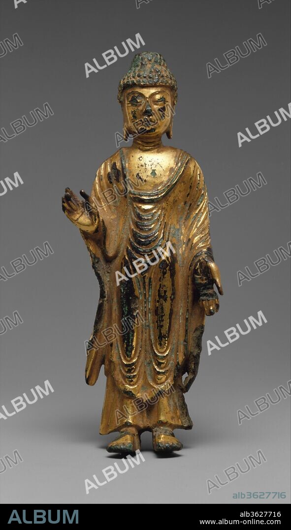 Standing Buddha. Culture: Korea. Dimensions: H. 5 1/2 in. (14 cm). Date: 8th century.
The gilt-bronze statue is a typical small icon made for private devotion in the Unified Silla kingdom and exemplifies a high point in the production of Buddhist sculpture in Korea. The Buddha's hand gesture (mudra) symbolizes the dispelling of fear and the granting of wishes.