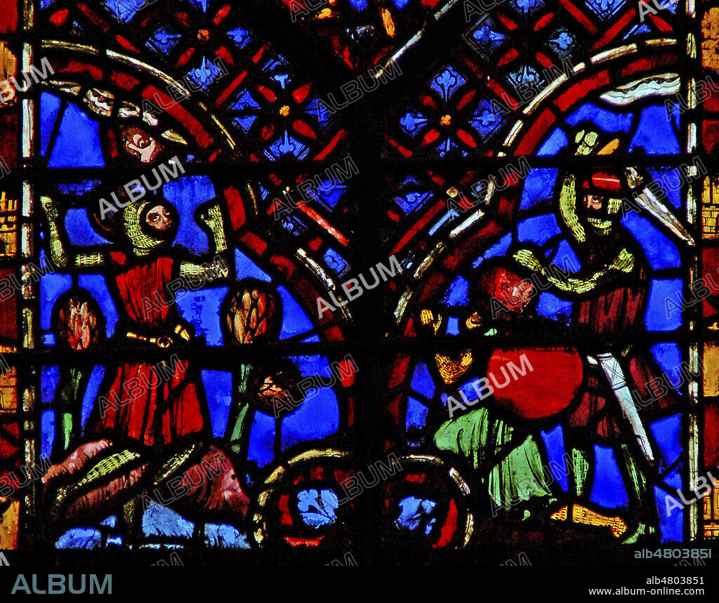 Moise a gche et Josue a dte combattent Amalek, chef des Amalecites. Vitrail de la Ste Chapelle datant du 13eme s. Photographie par Painton Cowen. Credit : Collection Cowen/KHARBINE-TAPABOR.