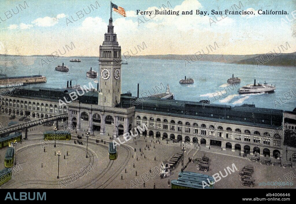 Ferry Building, San Francisco, California, USA, 1922. Vintage postcard showing the Ferry Building and Embarcadero. A number of ferries are visible in San Francisco Bay beyond the building. Completed in 1898, San Francisco's Ferry Building was the embarkation point for ferries connecting the city with the eastern shore of San Francisco Bay.