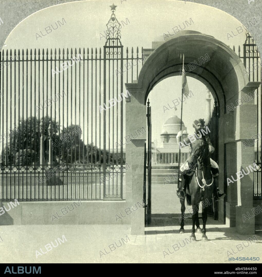 'Through a Sentry-guarded Gateway to the Beautiful Government Buildings of New Delhi, the Imperial Capital of India', c1930s. Indo-Saracenic Secretariat Building built in 1910s by Herbert Baker, administered the Government of India in Delhi, capital of the British Indian Empire from 1911. From "Tour of the World". [Keystone View Company, Meadville, Pa., New York, Chicago, London].