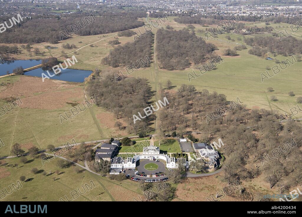 Deer park and White Lodge, Richmond Park, Richmond upon Thames, London, 2018. Now the home of the Royal Ballet School, White Lodge is a Palladian former hunting lodge designed by Roger Morris for King George II in the 1920s. The grounds were designed by Humphry Repton in c1805.