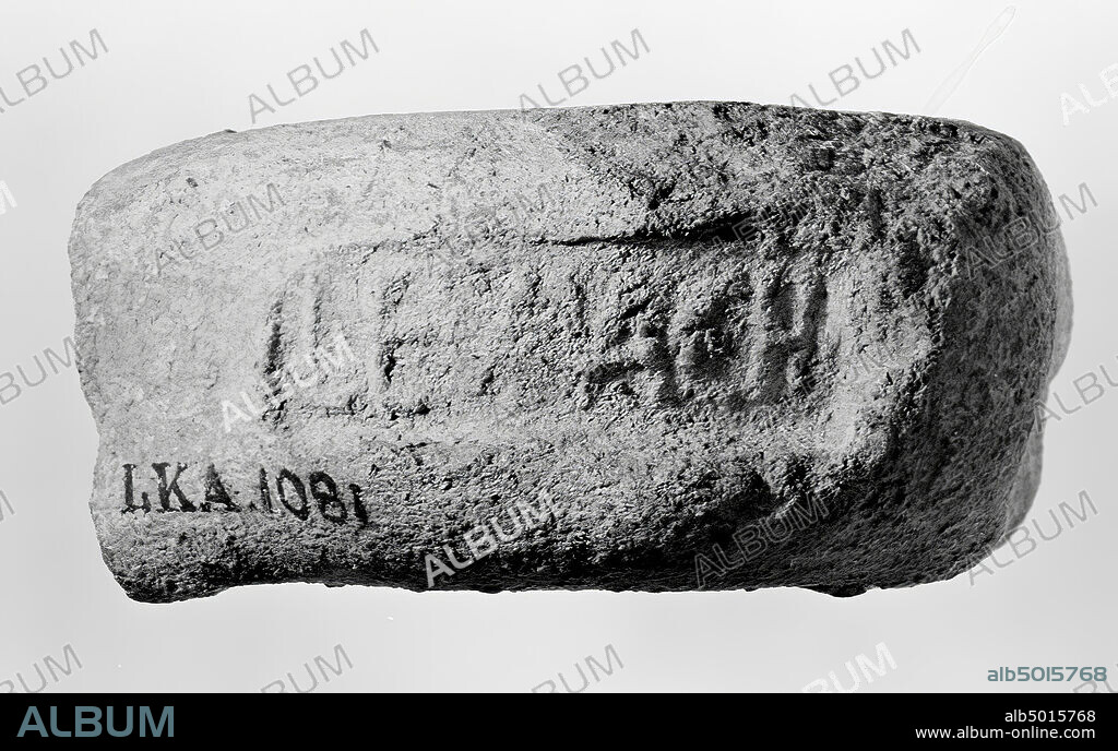 Roman coarse true handle fragment of amphora. Stamp: LEACH ... ?? Roman coarse true handle fragment or amphora. Stamp in Greek :, vase, fragment, amphora, pottery, Roman, coarse ware, late Greek, early Roman, Turkey.
