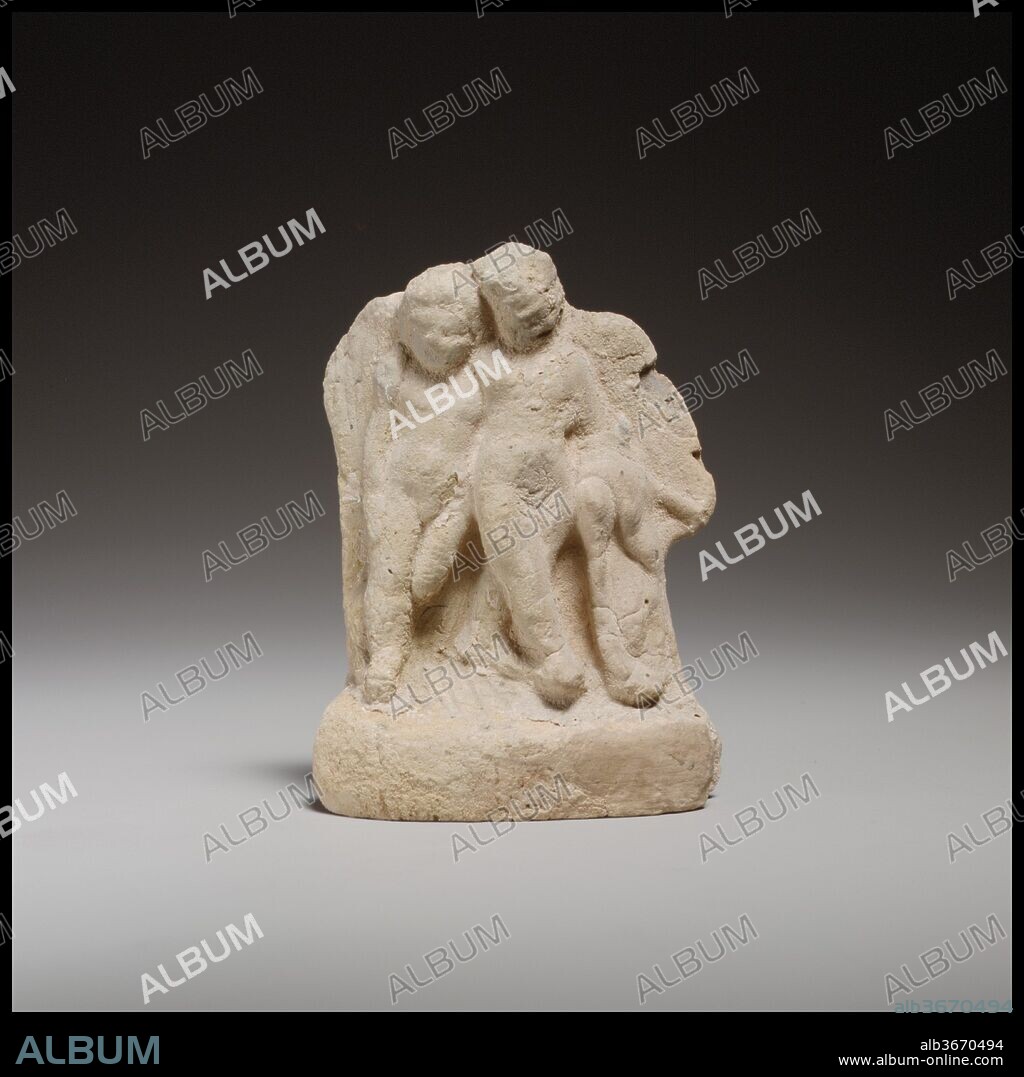 Relief with two nude girls. Culture: Cypriot. Dimensions: H. 2 1/2 in. (6.4 cm). Date: 3rd century B.C.(?).
The mold-made relief of two standing girls is probably a vase attachment. The back is handmade and flattened.