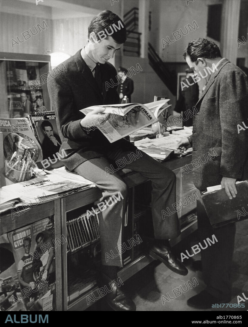 Anthony Perkins reading. The American actor Anthony Perkins reading the newspaper. January 1962.