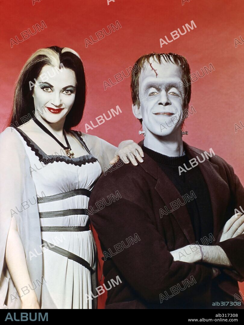 FRED GWYNNE and YVONNE DE CARLO in THE MUNSTERS, 1964, directed by EARL BELLAMY, EZRA STONE, GENE REYNOLDS, JERRY PARIS, JOSEPH PEVNEY and NORMAN ABBOTT. Copyright CBS/MCA/UNIVERSAL.