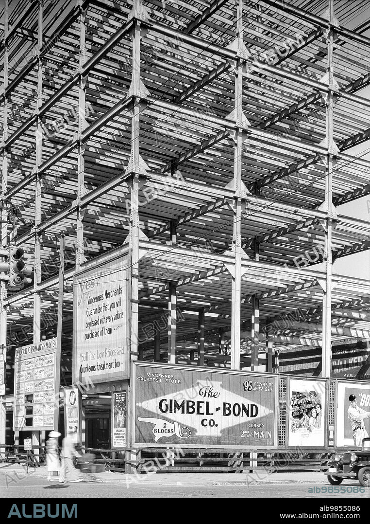 Uncompleted hotel on Main Street, started in 1929, but never finished due to depression, Vincennes, Indiana, USA, Arthur Rothstein, U.S. Farm Security Administration, June 1938.