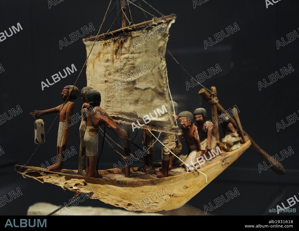 ARTE EGIPCIO. EGIPTO. Maqueta de madera de una pequeña embarcación con remeros. Madera, con restos de policromía. Pieza procedente de la tumba Wadjet-hotep Sedment. Dinastía VII-XI a. C. 2150-2050 a. C. Entre el Primer Período Intermedio e Imperio Medio. Museo Carlsberg Glyptotek. Copenhague. Dinamarca. Norte Europa.
