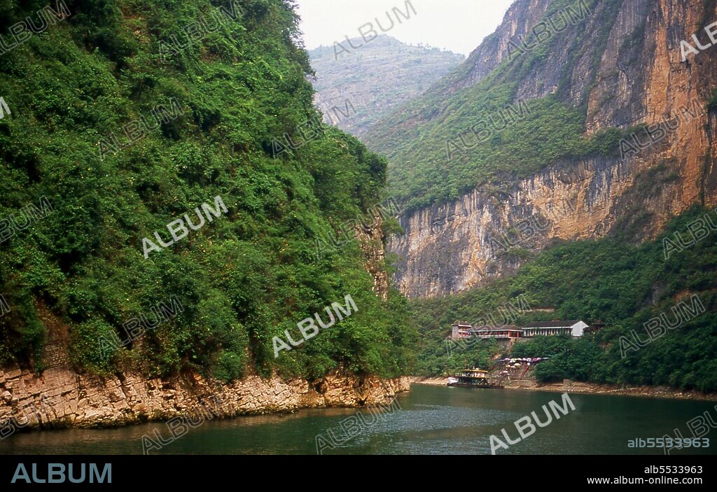 The Three Gorges or Yangtze Gorges span from the western—upriver cities of Fengjie and Yichang in Chongqing Municipality eastward—downstream to Hubei province. The Yangtze River (Chang Jiang)—Three Gorges region has a total length of approximately 200 kilometres (120 mi). The Three Gorges occupy approximately 120 kilometres (75 mi) within this region.  The Chang Jiang (Yangzi River) is the longest river in China and third longest in the world. Known upstream as the Golden Sand River, it flows through the geographical, spiritual and historical heart of China. From its source in the Tanggula Mountains of Qinghai province, the Yangzi flows southeast through Tibet as the Tongtian, turns south, then north as the Jinsha, and becomes the Yangzi proper after Yibin in Sichuan. Here, it swings eastwards once again, crossing Hubei, Hunan, Jiangxi, Anhui and Jiangsu provinces to reach the East China Sea at Shanghai. Its source-to-mouth length is 6,300 km (3,915 miles).