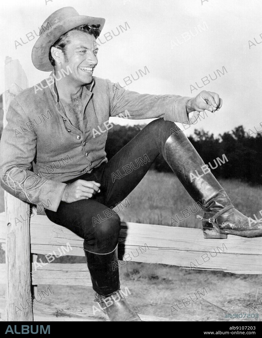 RICHARD EGAN in LOVE ME TENDER, 1956, directed by ROBERT D. WEBB. Copyright 20TH CENTURY FOX.