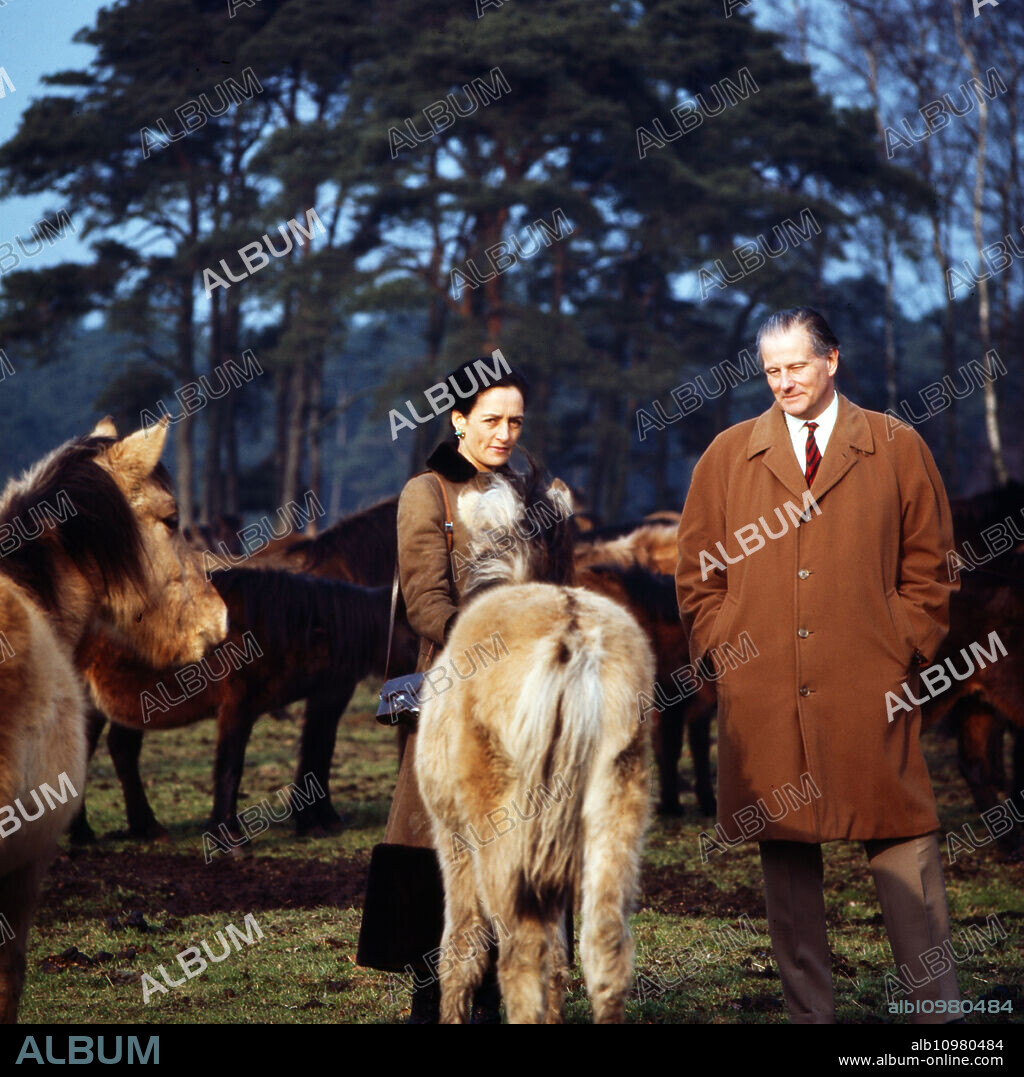 Karl Emanuel, 14th duke of Croy with his wife Gabriele Princess of Bavaria and their wild horses at Duelmen, Germany 1981.