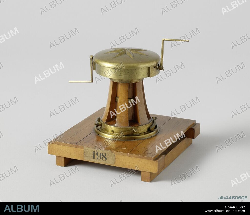 Model of a Capstan with a Winch, Model of a capstan on a wooden floor. It is a pivot with a winch in the head and four catches in the heel to prevent it from walking back. The head has a loose wooden cover decorated with a star and is attached to the brass shaft, which is placed in the reinforced floor with a square heel. The drum is provided with a toothed wheel under the head, which is driven by two cranks with pinions in the head, the drum therefore turns under the head. The handles can be disengaged with two wedges on either side. The drum has six cleats. Scale 1:10 (estimate), Rijkswerf Rotterdam, c. 1834 and/or c. 1830, wood (plant material), brass (alloy), model: h 16.7 cm × l 18.3 cm × w 18.2 cm packaging capsule: h 22.5 cm × w 82.5 cm × d 22.5 cm.