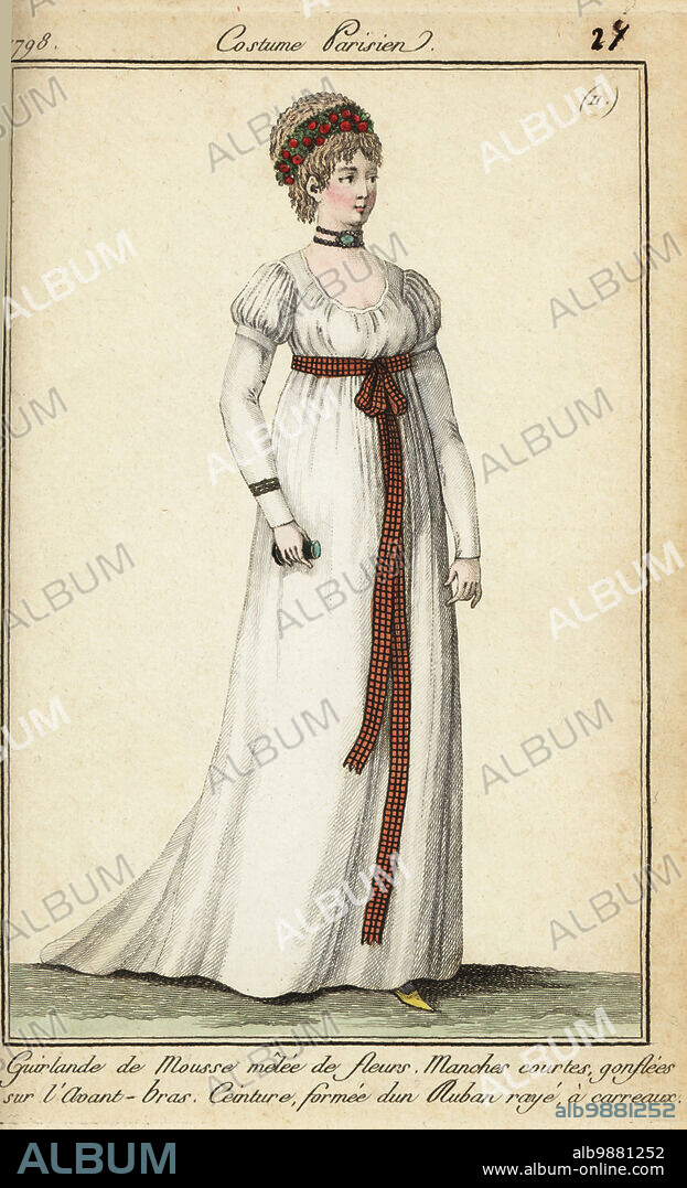 Woman in the fashions of 1798 with short hair under a garland. She wears a short victim hairstyle under a garland of moss and flowers. Her white tunic dress has short sleeves puffed on the shoulder. Her belt is a checked ribbon. She holds an eyeglass. Guirlande de mousse melee de fleurs. Manches courtes, gonflees sur l'avant bras. Ceinture forme d'une ruban raye a carreaux. Handcoloured copperplate engraving from Pierre de la Mesangeres Journal des Modes et Dames, Paris, 1798. The illustrations in volume 1 were by Carle Vernet, Claude Louis Desrais and Philibert Louis Debucourt.