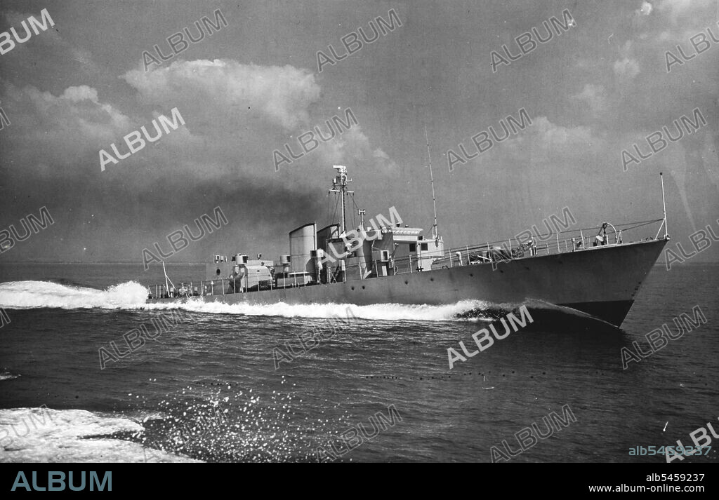 Navy Tests Gas Turbines In Gunboat -- HMS Grey Goose at speed in the Nab Tower area during Channel trials today (Tuesday).HMS Grey Goose, renowned as a steam gunboat during World War II, is new undergoing rigorous trials in the English Channel as a floating test bed powered by two experimental Rolls-Royce RM.60 marine gas turbine engines.The engines transmit their power through controllable pitch propellers which obviate the use of reverse gearing.The gas turbines are expected to give total power about 35 per cent greater than that of two 4,000 h.p. steam turbines the ship originally had. July 05, 1955. (Photo by Reuterphoto).