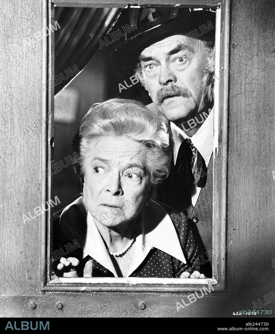 HELEN HAYES and JOHN McINTIRE in HERBIE RIDES AGAIN, 1974, directed by ROBERT STEVENSON. Copyright WALT DISNEY PRODUCTIONS.