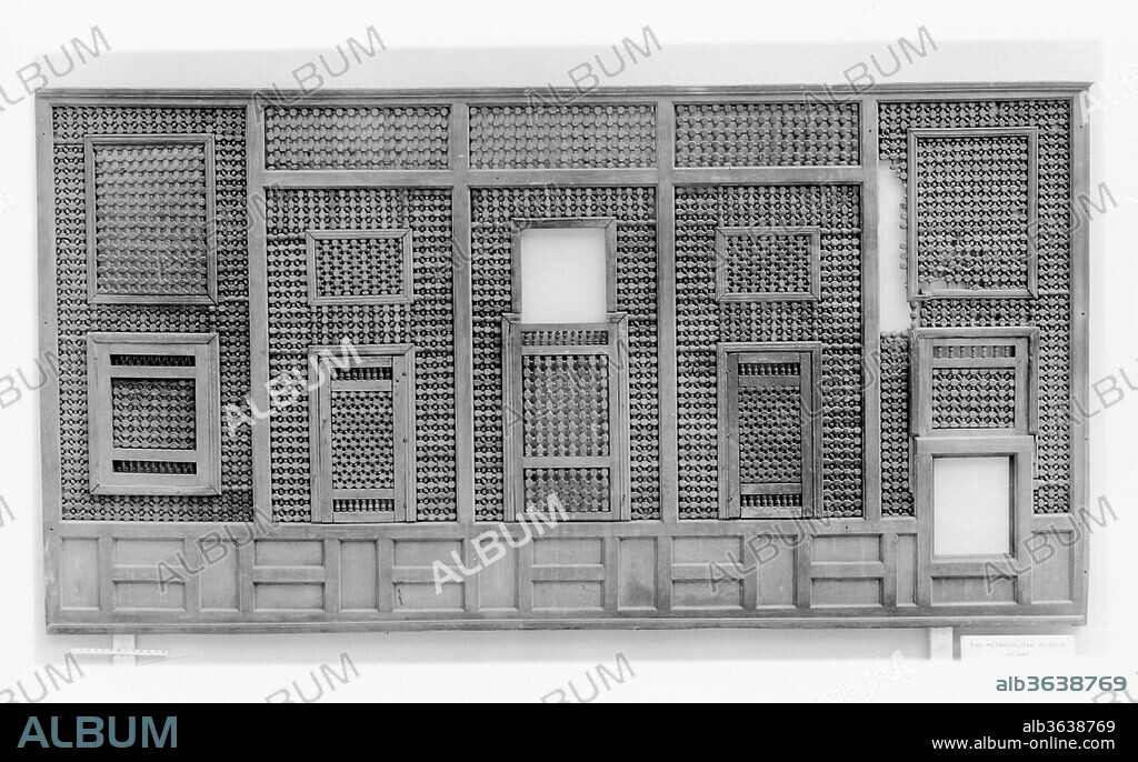 Mashrabiyya Screen. Dimensions: H. 64 in. (162.6 cm)
W. 120 in. (304.8 cm)
D. 2 in. (5.1 cm). Date: 15th-16th century.
The mashrabiyya, a wooden screen, shows a variation of the window design, with small openings that are rectangular rather than horseshoe arch shaped. Through these openings the onlooker could observe the world outside without being noticed.