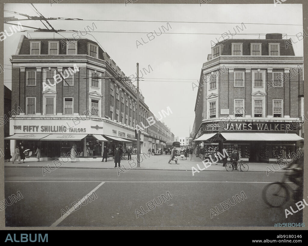 HEALEY AND BAKER. Castle Street, Kingston upon Thames, Greater London Authority, 1939-1950. A view from Fife Road looking south into Castle Street, showing the shopping parades on either side, with people on the streets.