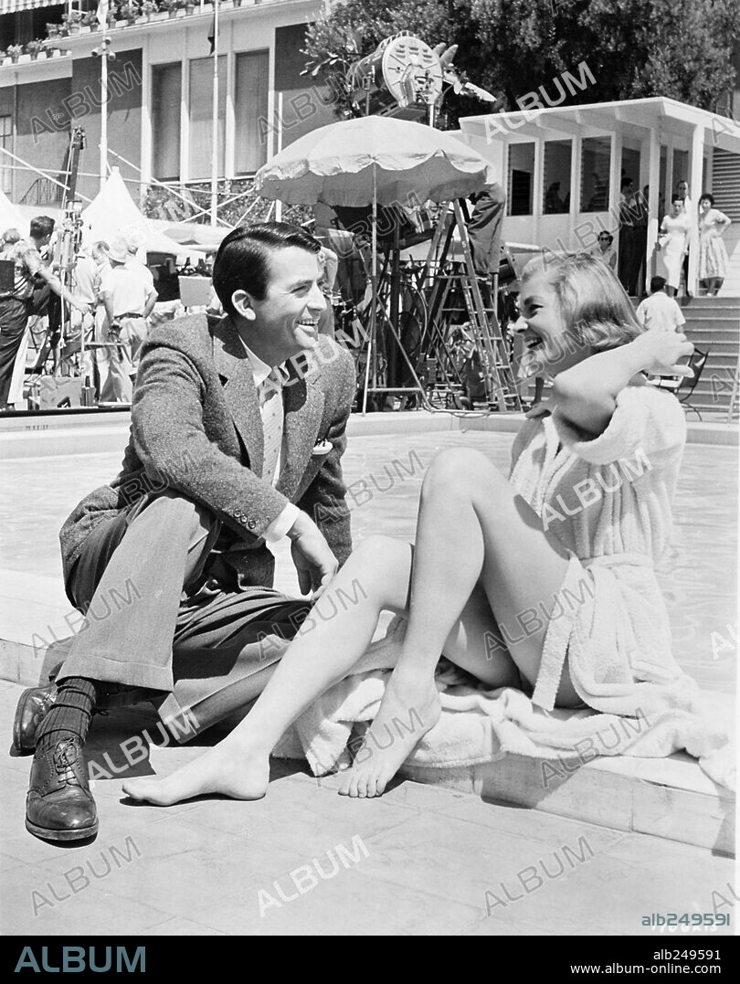 GREGORY PECK y LAUREN BACALL en MI DESCONFIADA ESPOSA, 1957 (DESIGNING WOMAN), dirigida por VINCENTE MINNELLI. Copyright M.G.M.