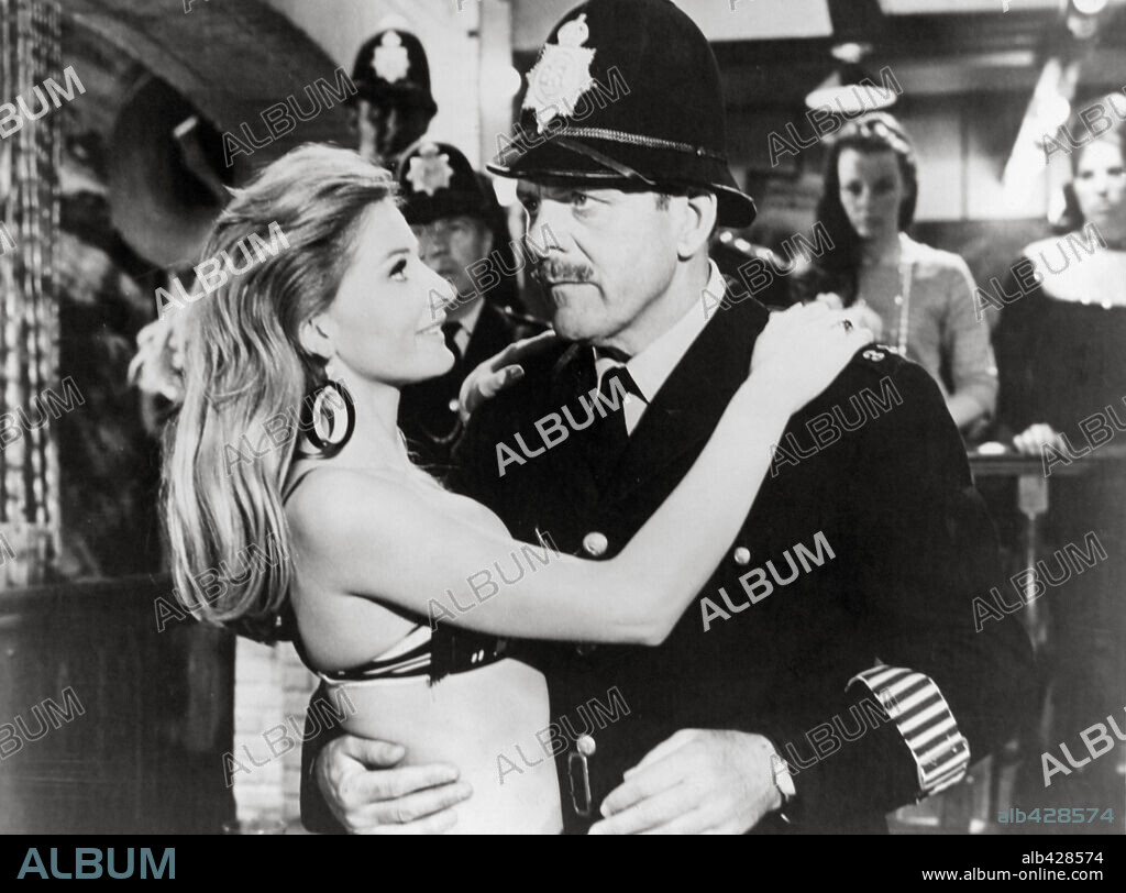 JILL IRELAND and TERRY-THOMAS in THE KARATE KILLERS, 1967, directed by BARRY SHEAR. Copyright M.G.M.