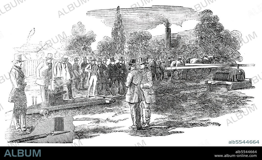 UNKNOWN. Fowler's New Subsoil Draining Plough, 1850. 'An experimental trial of Fowler's Patent Draining Plough and Machinery took place...in a field at the back of Mr. John Smith's iron foundry, at Uxbridge [now part of west London], where considerable improvements have been effected, under the immediate direction of the inventor. The trial..was attended by a large and most respectable body of agriculturists..who watched the operations of the machine with great interest, and were unanimously of opinion, that, when the result of a few more experiments had enabled the inventor to apportion the strength of the various parts to the relative strain, it would become one of the most practically useful and economical apparatus for draining purposes that has hitherto been introduced to the notice of the agricultural community'. From "Illustrated London News", 1850.
