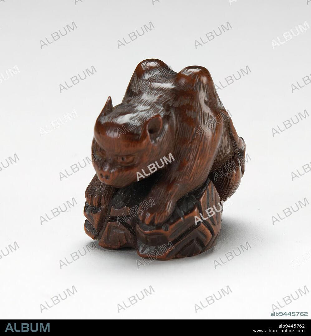 Tiger and rocks, late 19th century, Masano (of Ise), Chinese, 1 1/2 x 1 1/16 x 1 5/8 in. (3.81 x 2.7 x 4.13 cm), Wood, China, 19th century.