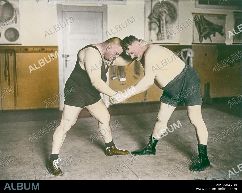 Sport / Wrestling. Russian wrestler Ivan Poddubny and German wrestler Georg Strenge before a match during the International Wrestling Tournament at Thalia Theatre in Berlin. Photo, 1925. Coloured later.