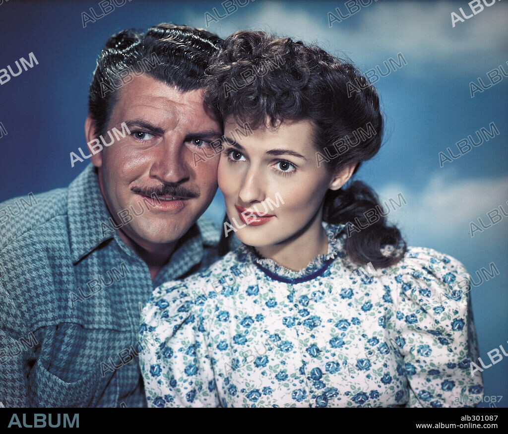 BRENDA MARSHALL y ROBERT PRESTON en SMITH EL SILENCIOSO, 1948 (WHISPERING SMITH), dirigida por LESLIE FENTON. Copyright PARAMOUNT PICTURES.