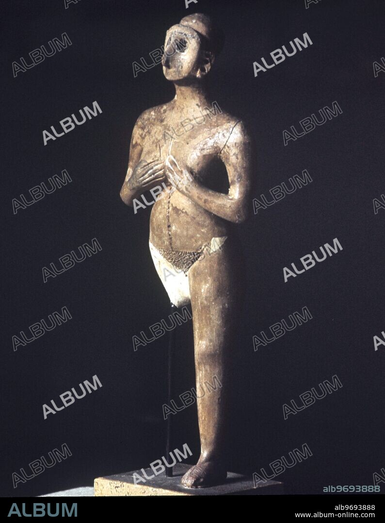 Image No. IR3TD5. Astarte, female fertifity cult figure. 1500 BC. Turang Tepe, Iran.. Tehran Museum.