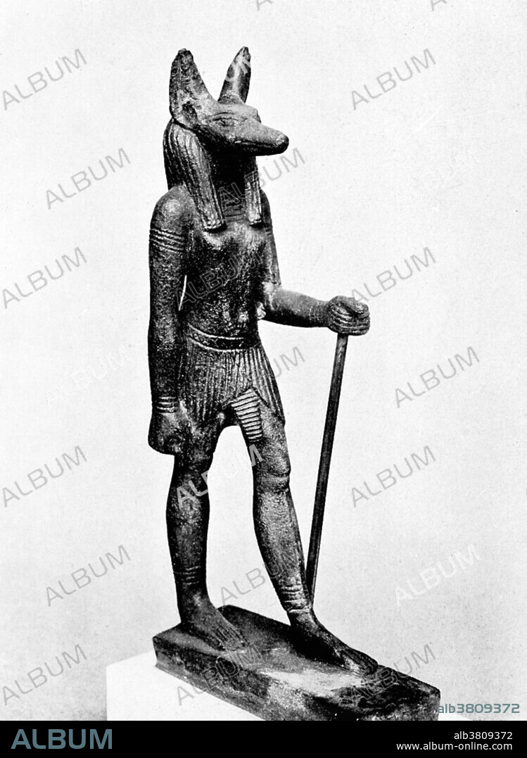 Statuette of Anubis, god of the dead and medicine, Ancient Egypt, c. 500 BC. From "The Mystery and Art of the Apothecary" by Charles John Samuel Thompson, 1929. Anubis, also known as Anpu and Anepu, is the Egyptian god of the dead and is represented as a man with a jackal's head. He is especially involved with embalming and care of the dead.