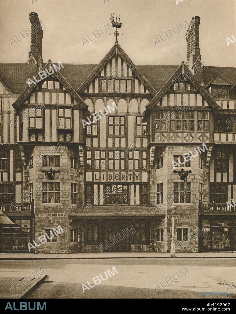 'Part of Liberty's Tudor Building in Great Marlborough Street', c1935. Liberty's department store in Great Marlborough Street, central London, was designed in mock Tudor style by E Stanley Hall and opened in 1924. The 4-foot weather vane is a model of the pilgrims' ship 'Mayflower'. From "Wonderful London, Volume 3", edited by Arthur St John Adcock. [The Fleetway House, London, c1935].