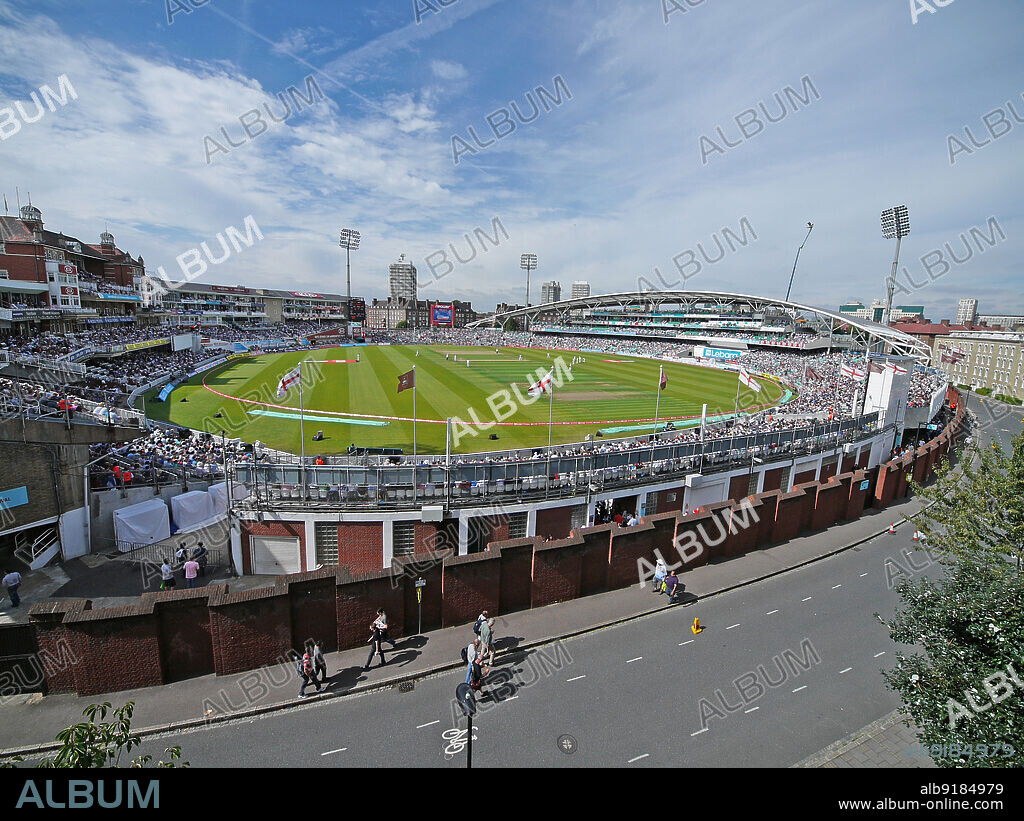 SIMON INGLIS. The Oval Cricket Ground, Kennington, Lambeth, Greater London Authority, 2011. An elevated view looking west over the Oval Cricket Ground during a game in play between England and India. The handlist records that this photograph was taken from Lohmann House on Kennington Oval. This was the third day of the fourth test match between England and India in the 2011 Test series.