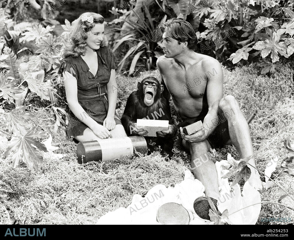 BRENDA JOYCE and LEX BARKER in TARZAN'S MAGIC FOUNTAIN, 1949, directed by LEE SCHOLEM. Copyright RKO.