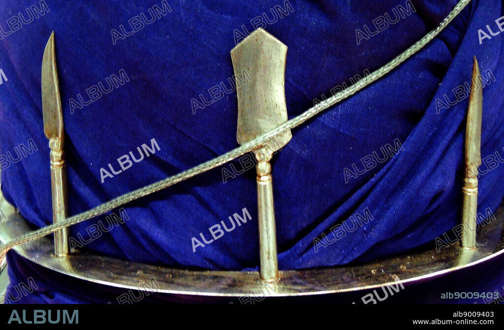 The khanda is an Indian double-edge straight sword. It was used by the Marathas, Rajputs, Jats, Nairs and Sikhs. The blade is usually broad and quite heavy and broadens from the hilt to the tip. The blade transforms into tip rather abruptly. The hilt has a small metal spike coming out in the opposite direction typical of the khanda. Many other straight swords around the world were primarily used for thrusting and stabbing with the tip, whereas the khanda was mainly used to hack or cleave with the edge of the blade.