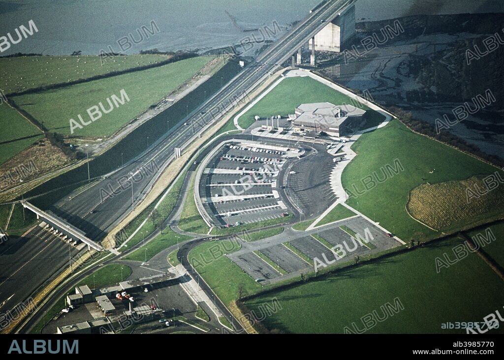 Aust Services, Aust, South Gloucestershire, 1971. Large service station at the English end of the Severn Road Bridge, serving the former route of the M4 motorway. The motorway opened in 1966 and was the main arterial route to South Wales for 30 years. The service station closed after the opening of the Second Severn Crossing in 1996 but has been replaced on a new site called Severn View Services.
