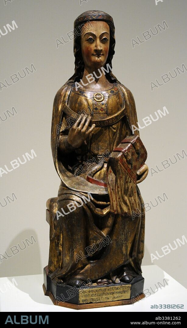 Santa, hacia 1300. Grupo de San Bertran de Cominges, Francia. Gótico. Talla de madera de abedul policromada y dorada con pan de oro. Procedencia desconocida. Museo Nacional de Arte de Cataluña. Barcelona. Cataluña. España. Saint. Ca.1300.Group of Saint-Bertrand-de-Comminges, France. Gothic style. Polychrome birch wood with gold leaf. Provenance unknown. National Art Museum of Catalonia. Barcelona. Catalonia. Spain.