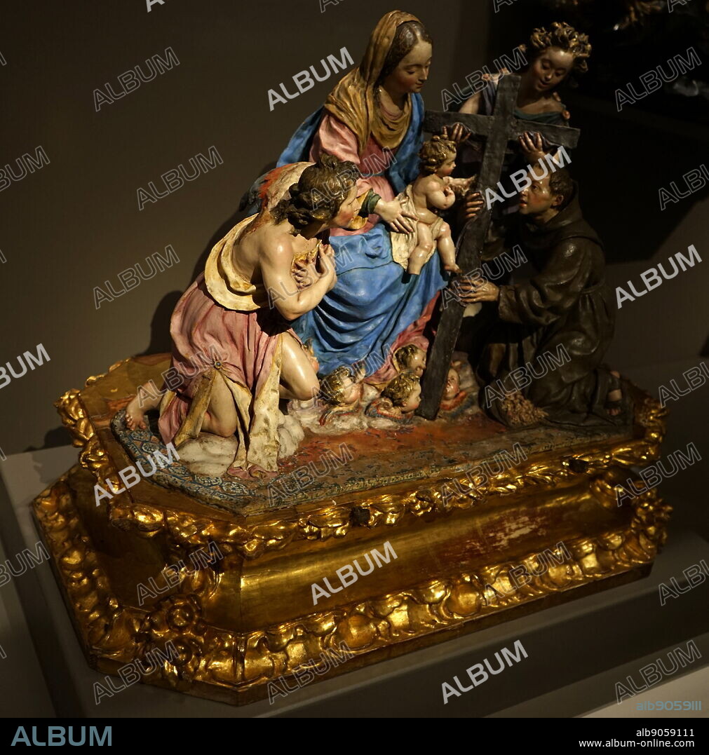 Sculpture titled 'The Virgin and Child with St Diego of Alcalá' by Luisa Roldán (1652-1706) a Spanish sculptor of the Baroque period. Dated 17th Century.