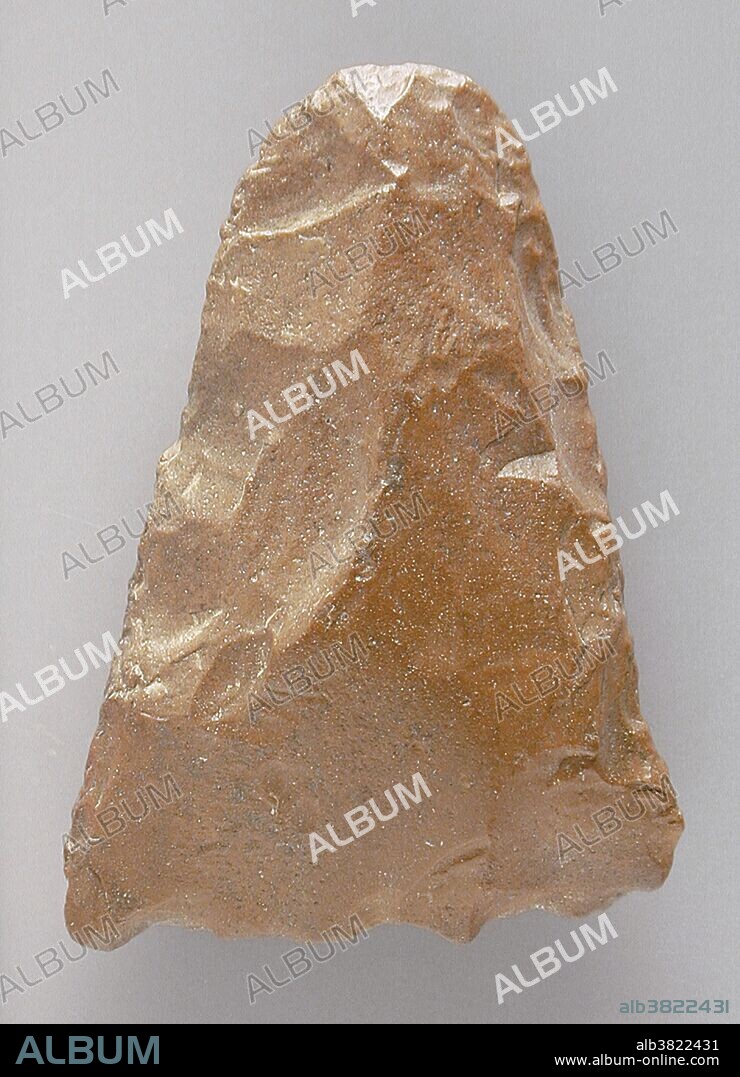 Egyptian flint, Neolithic Period (5500 - 3100 BC). A hand axe or biface is a prehistorical stone tool with two faces, and the longest-used tool in human history. Its technical name (biface) comes from the fact that the archetypical model is a generally bifacial Lithic flake with an almond-shaped morphology. The most common hand axes have a pointed end and rounded base, which gives them their characteristic shape, and both faces have been knapped to remove the natural cortex, at least partially.